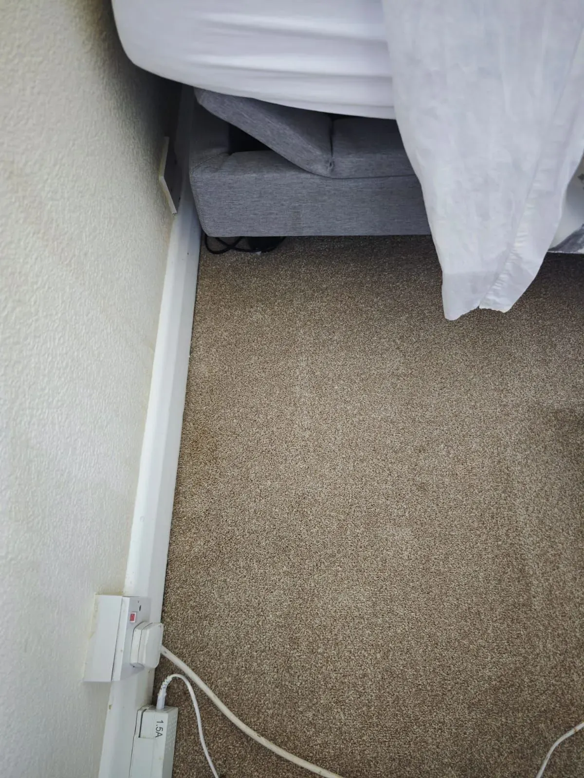 After: carpet edges, trapped dirt lifted along the skirting
