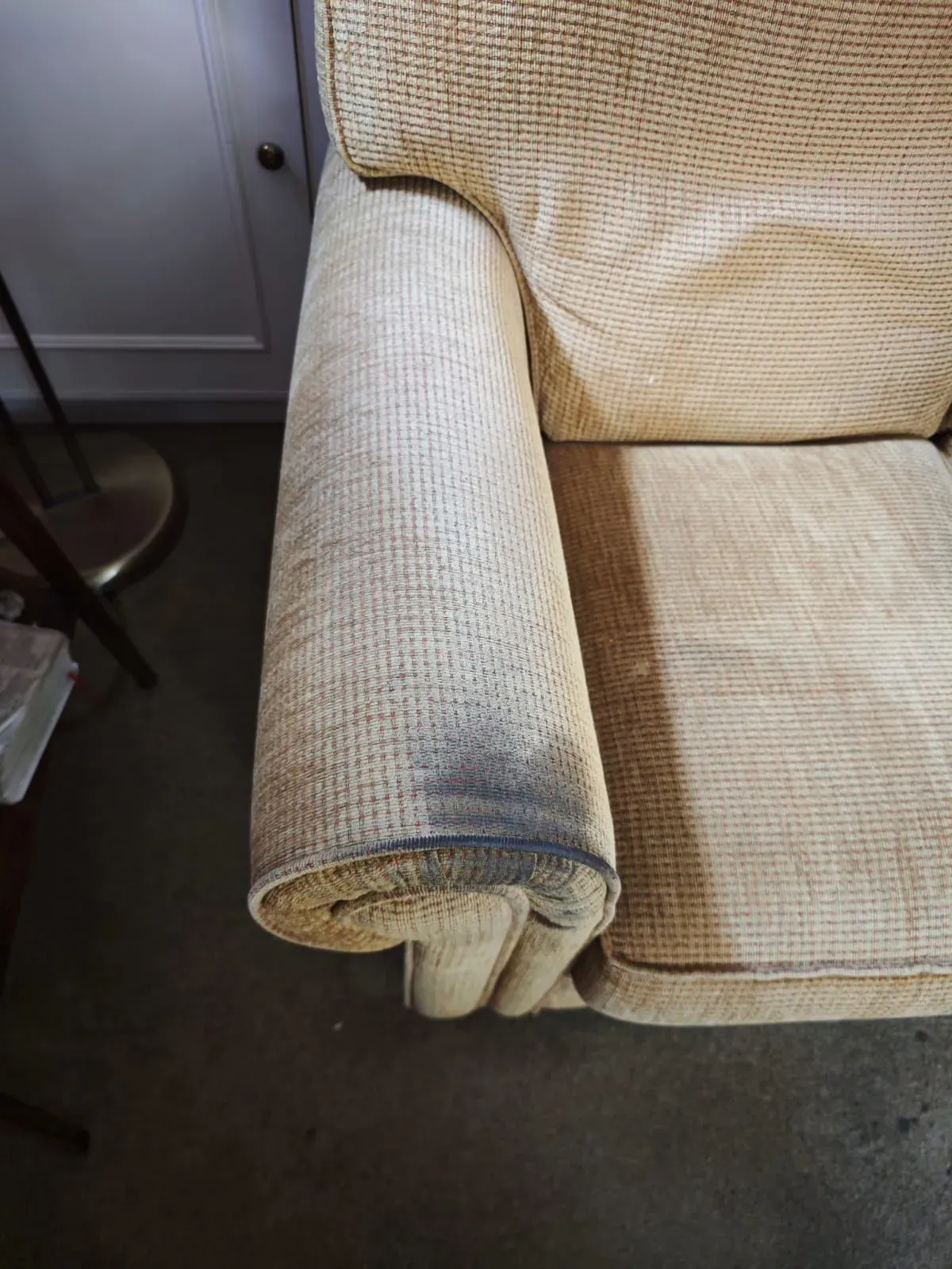 Before: sofa arm, grime and body oils gently extracted from textured weave